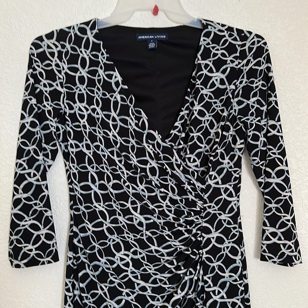 American living brand, black color with white mix light blue